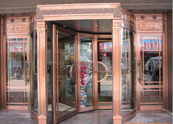 चीन Bronze Engraving Flower Hotel entrance automatic revolving door OEM service फैक्टरी